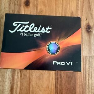 Titleist Pro V1 Golf Balls in Black and Orange Box